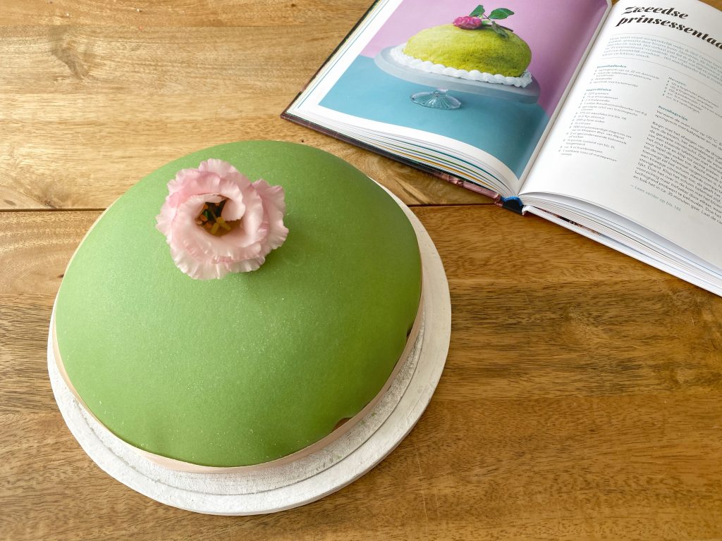 green Swedish princess cake with flower