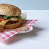 veggie burger on a checkered napkin