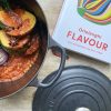 Flavour cookbook with dish in skillet